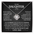 Silver-tone love-knot necklace on its To My Daughter message card, signed Love, Dad