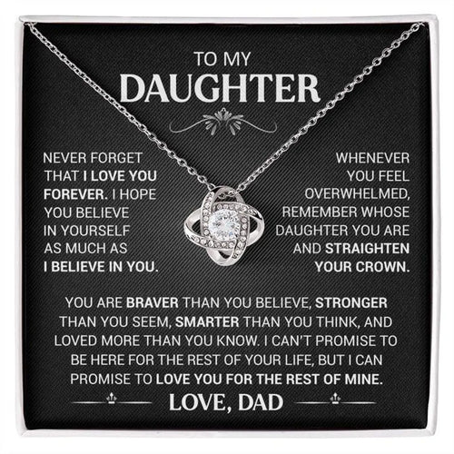 Silver-tone love-knot necklace on its To My Daughter message card, signed Love, Dad